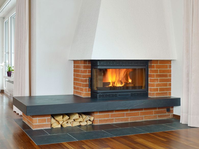 Eine in ein offenes Cheminée eingebaute Kaminkassette bringt nur Vorteile